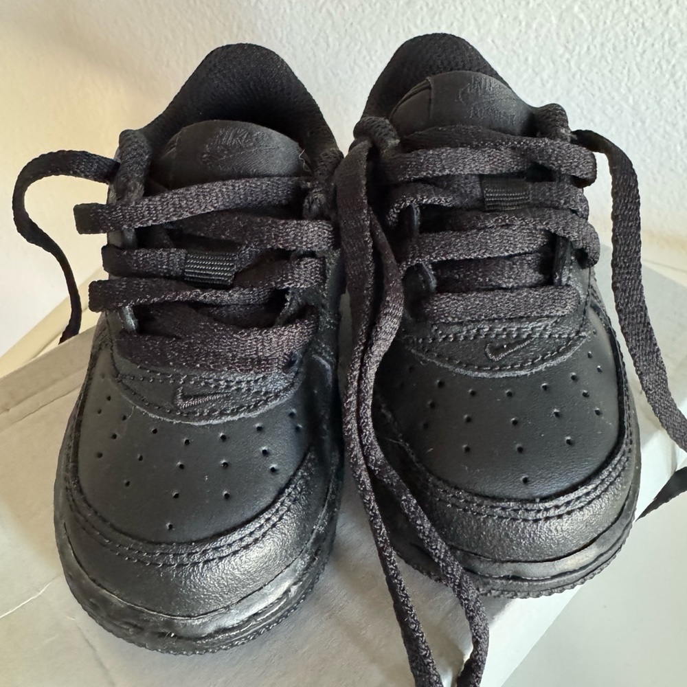 Nike black Air Force 1s baby
